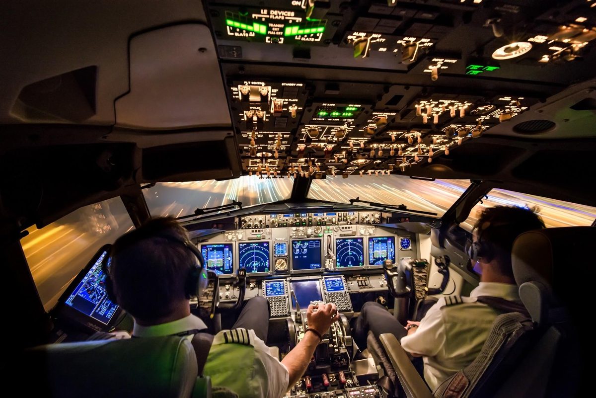 Boeing 737 on the apron at night